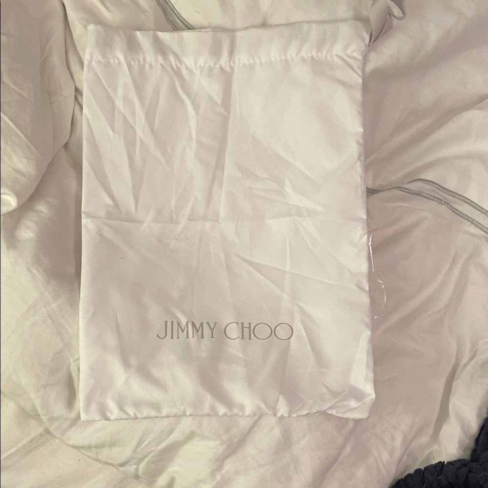 Jimmy Choo dust bag slight imperfection in bottom stitching